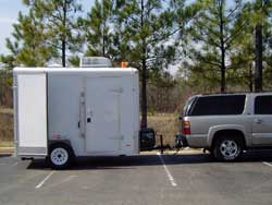 Econo Trailer sideview showing side door, and air conditioning